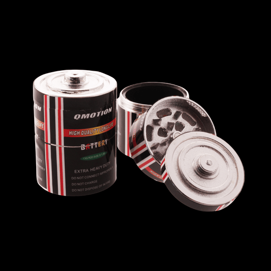 30 mm battery-style 3-part herb grinder opened to show metal teeth and catch chamber