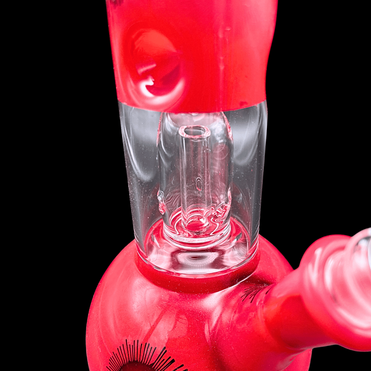 Close-up of the internal percolator and bowl on red glass bong