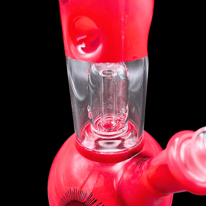 Close-up of the internal percolator and bowl on red glass bong