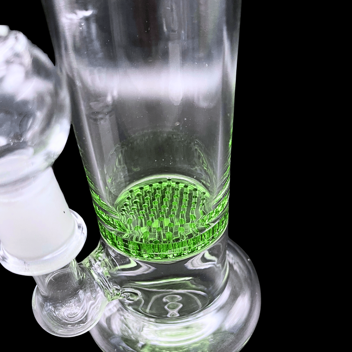 Close-up of green single honeycomb percolator inside Lime Matrix glass bong