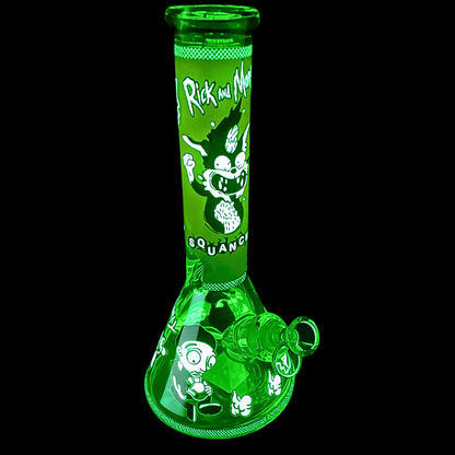Orange Squanchy glass beaker bong glowing green in the dark