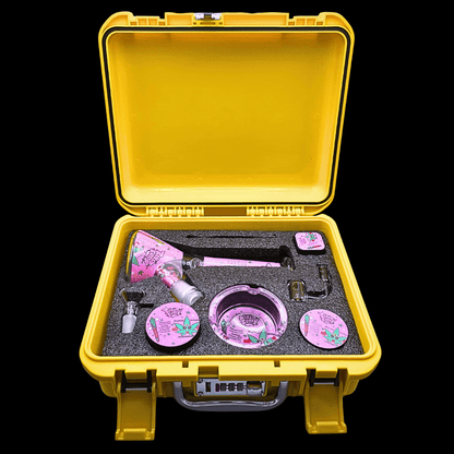 Open yellow locking hard case containing the Baked Bunny bong and dab accessories
