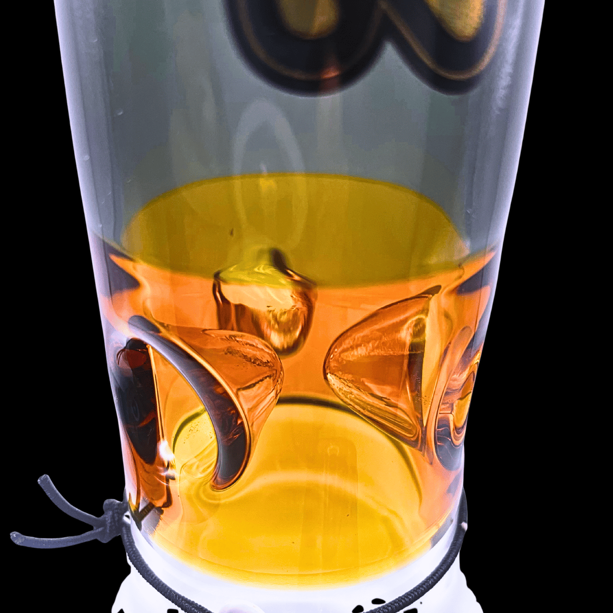 Close-up of the amber Chongz Beef Galore bong showing the internal ice notches