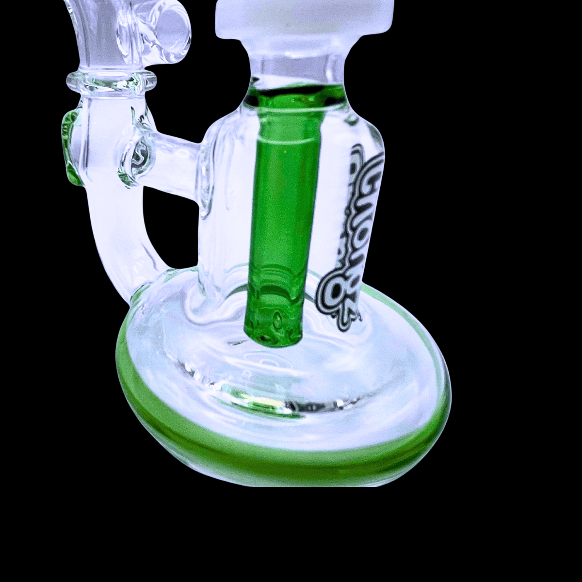 Close-up of the Chongz Mini Mal oil rig showing its green internal percolator and glass base
