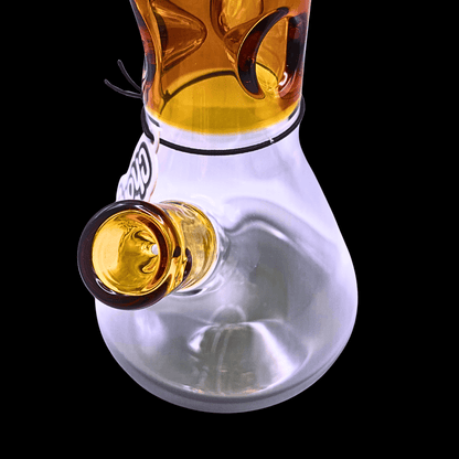 Close-up of the fixed glass bowl and rounded chamber on the amber Chongz Beef Galore bong
