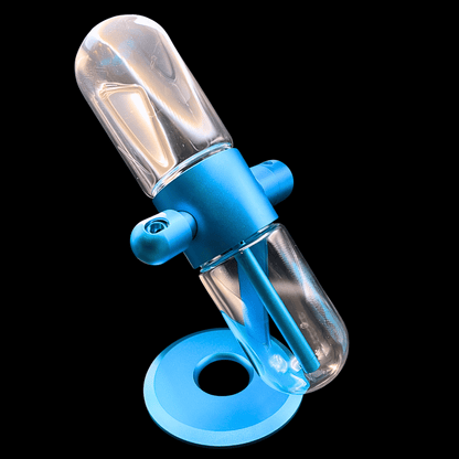 Angled view of the blue aluminium gravity bong with glass chamber and circular base