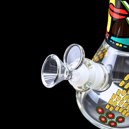 Close-up of the glass bowl and colourful dotted artwork on the beaker base