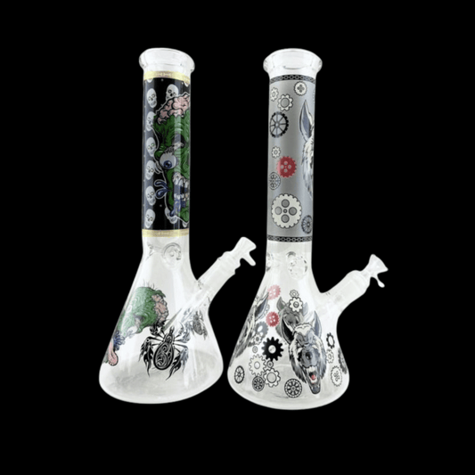 After Dark glow-in-the-dark glass beaker bong in assorted designs – 34cm