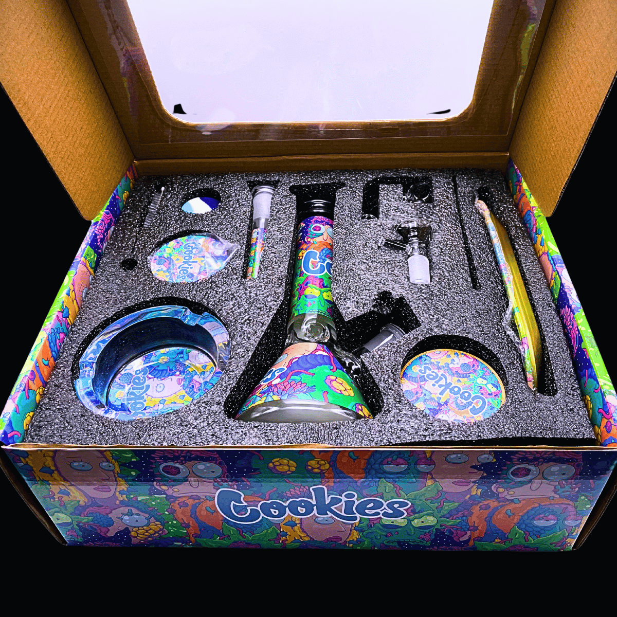 Open Rick and Morty gift box displaying the complete nine-piece bong accessory bundle