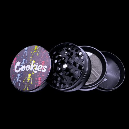 Open Cookies Skeleton metal grinder showing teeth, screen and collection chambers