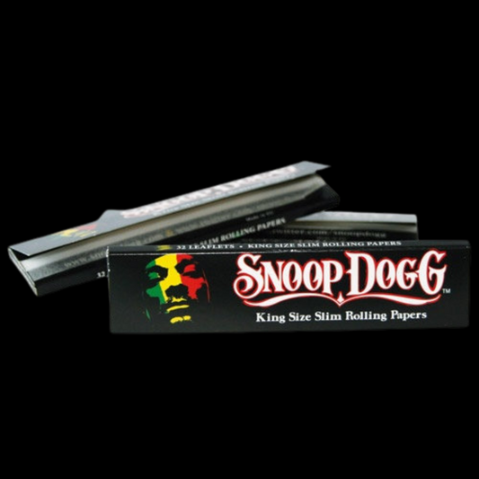 Close-up of Snoop Dogg rolling papers highlighting ultra-thin design.
